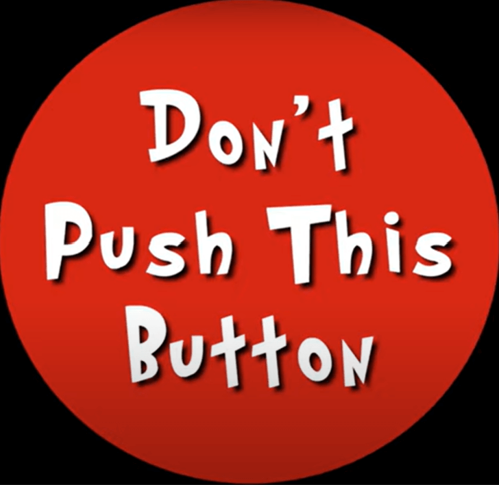 Round red circle with the words 'Don't Push This Button' in white